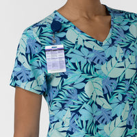 Women's 1-Pocket Tuck-in Print Scrub Top - Breezy Palms second badge loop