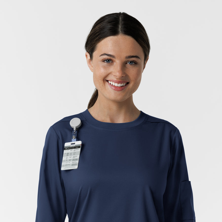 Boundless Women's Classic Long Sleeve Scrub Top - Navy badge loop