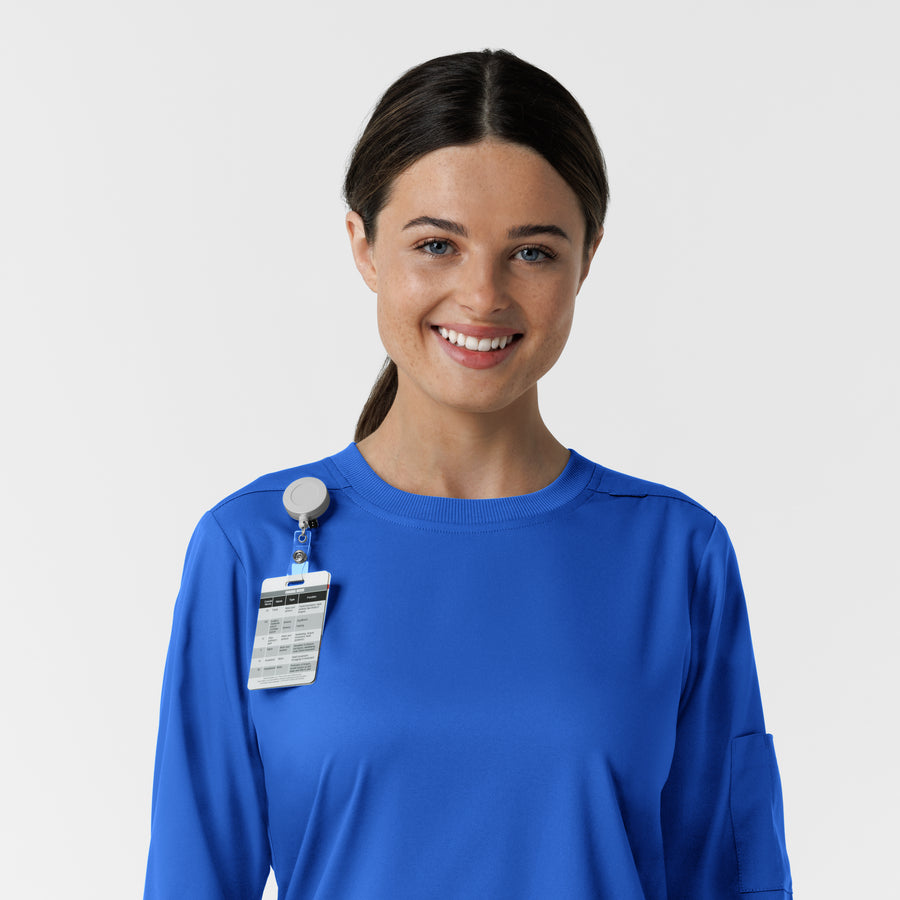 Boundless Women's Classic Long Sleeve Scrub Top - Royal badge loop