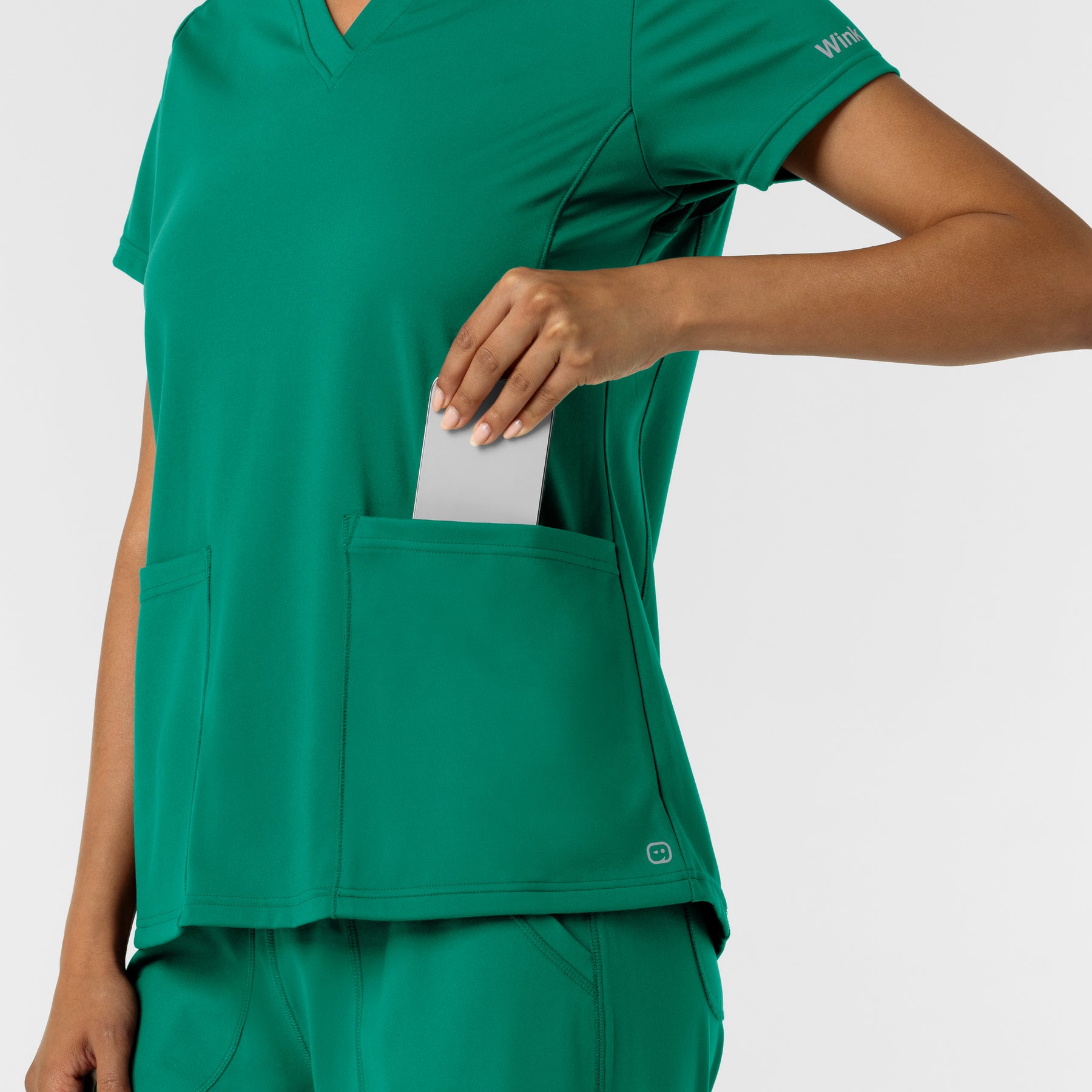 RENEW Knit Women's 2-Pocket Scrub Top Bahama Breeze hemline detail