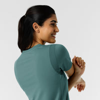 RENEW Knit Women's 2-Pocket Scrub Top - Vintage Teal flexible scrub panel