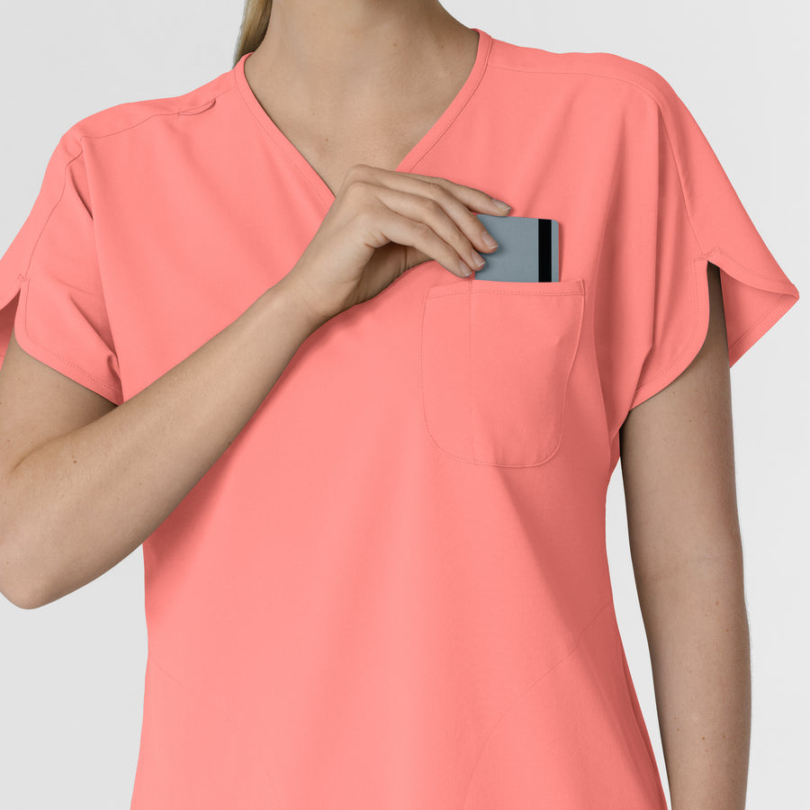 RENEW Women's Dolman Scrub Top Paradise Pink hemline detail
