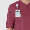 RENEW Women's The Rounds Half-Zip Mid Sleeve Scrub Top Carnation hemline detail
