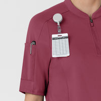 RENEW Women's The Rounds Half-Zip Mid Sleeve Scrub Top Carnation hemline detail