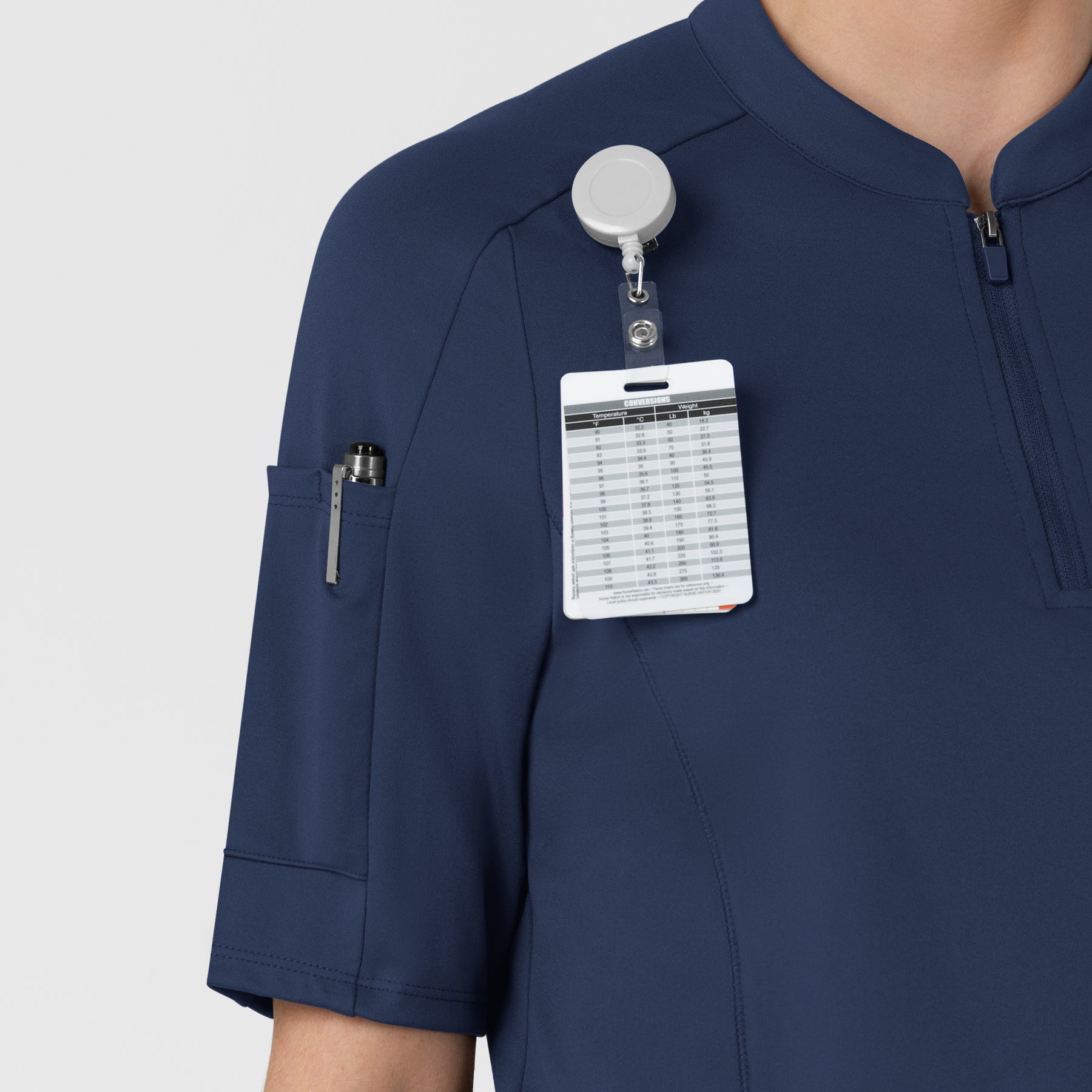 RENEW Women's The Rounds Half-Zip Mid Sleeve Scrub Top Navy hemline detail