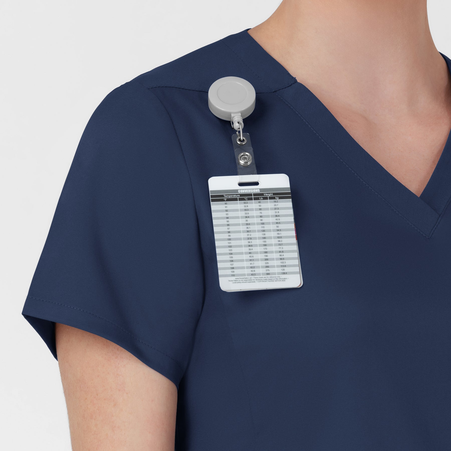 Boundless Women's Slip in Pockets V-Neck Scrub Top Navy side detail 1