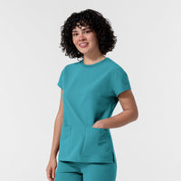 NURTUR Women's Cap Sleeve Crew Neck Scrub Top Teal Blue side view