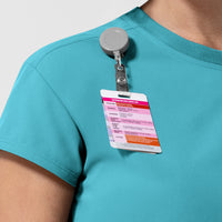 NURTUR Women's Cap Sleeve Crew Neck Scrub Top Teal Blue side detail 1