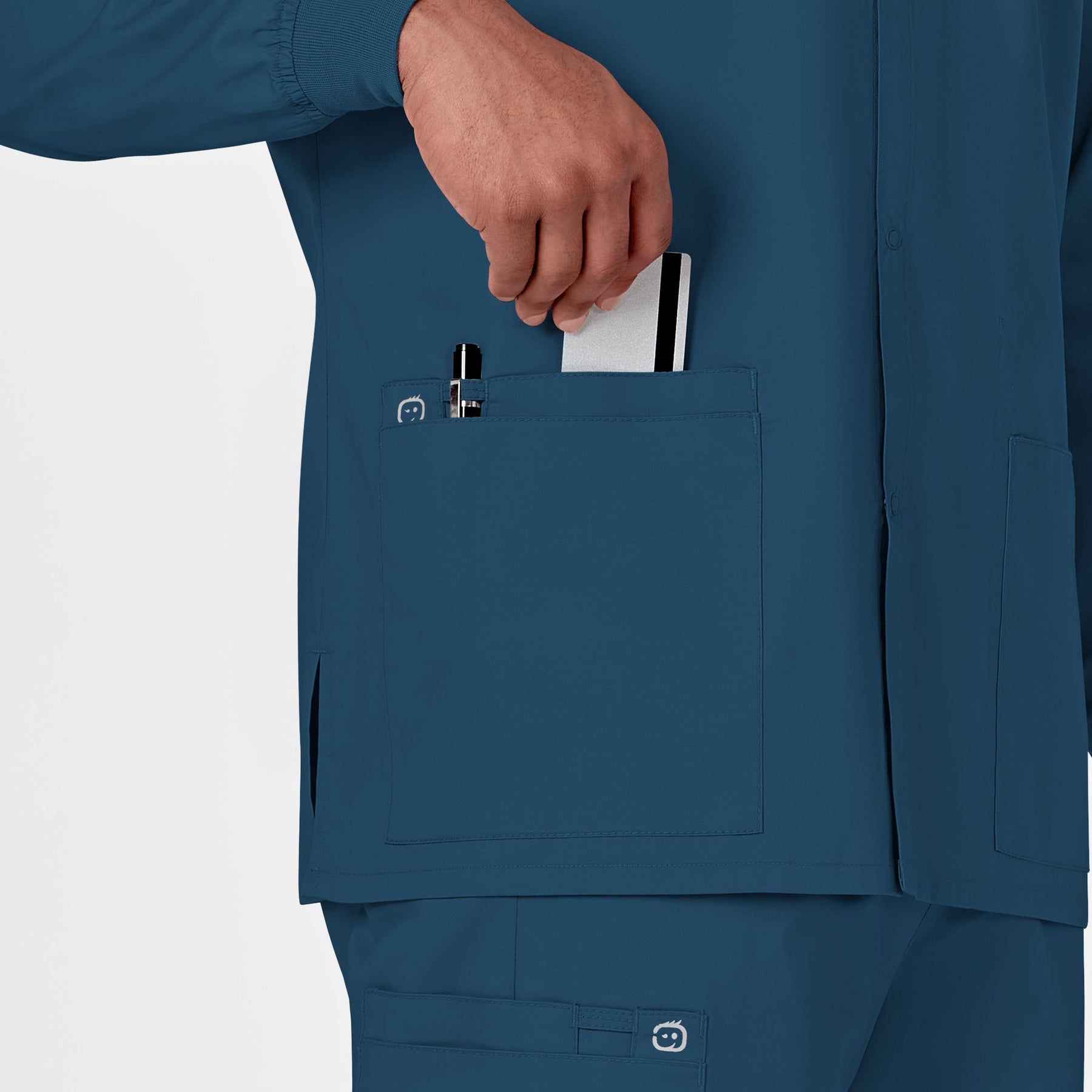 WonderWORK Unisex Snap Front Jacket Caribbean Blue hemline detail