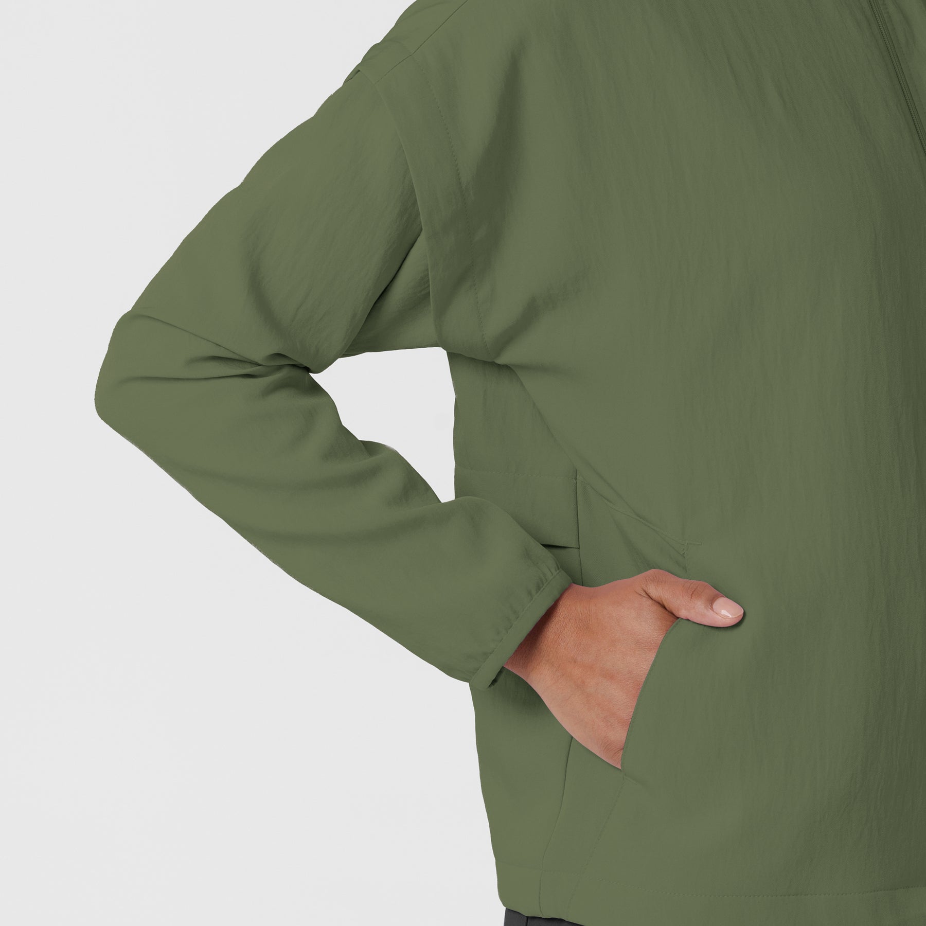 Knits and Layers Women's BreezeBreaker Scrub Jacket Olive hemline detail