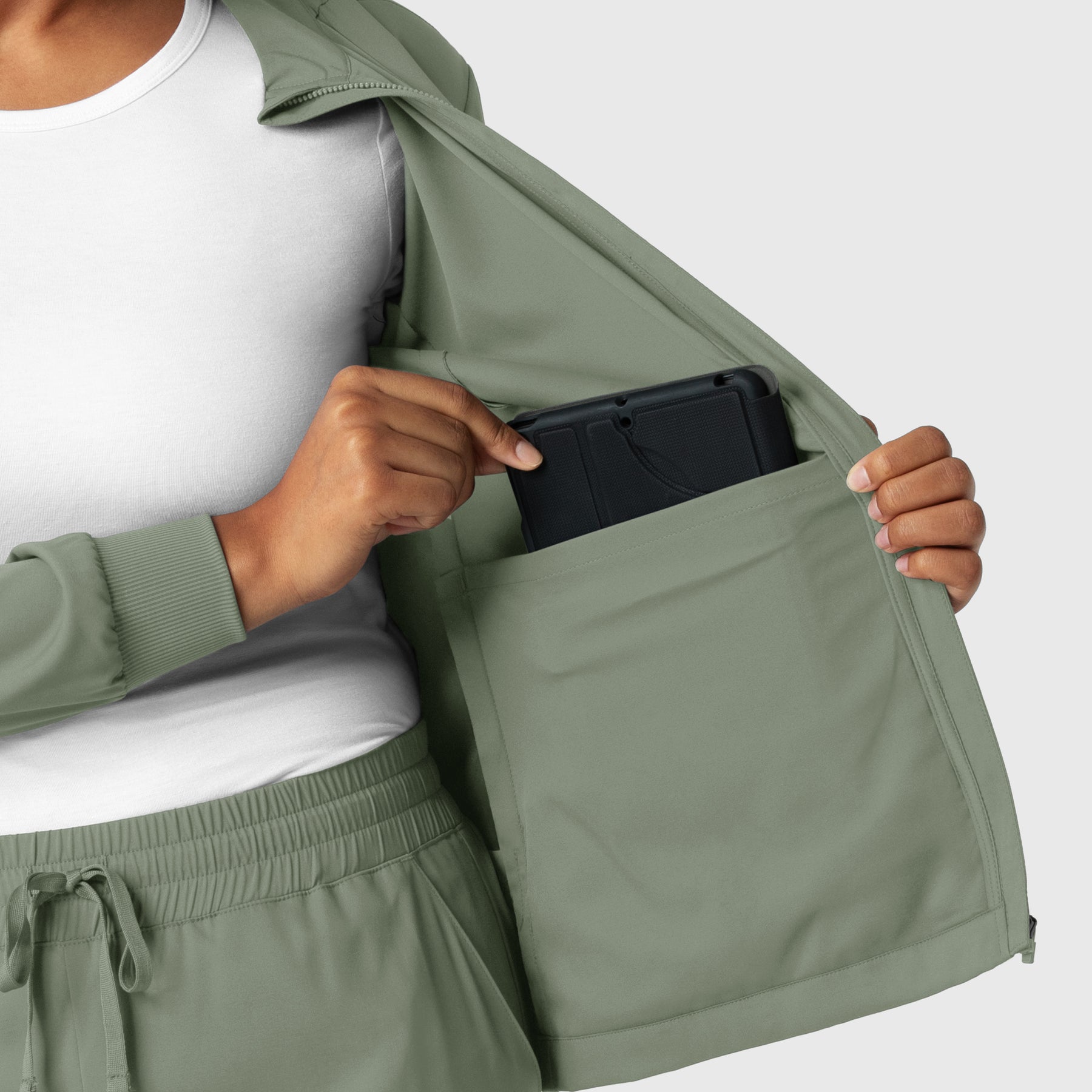 Boundless Women's Warm Up Jacket Sage hemline detail