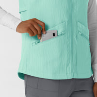 Layers Women's Everything Everywhere Scrub Vest Aruba Blue hemline detail