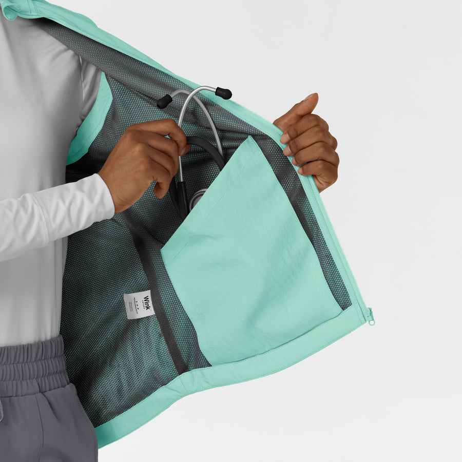 Layers Women's Everything Everywhere Scrub Vest Aruba Blue internal pocket