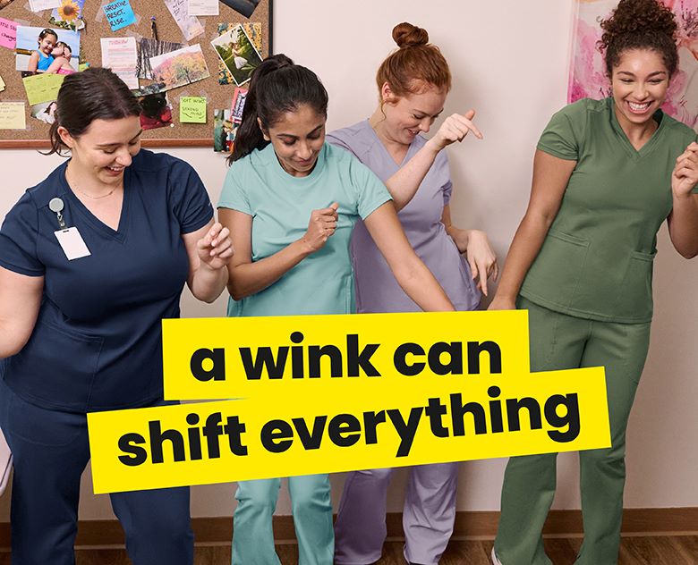 Group of people in scrubs with a yellow banner saying 'a wink can shift everything' 