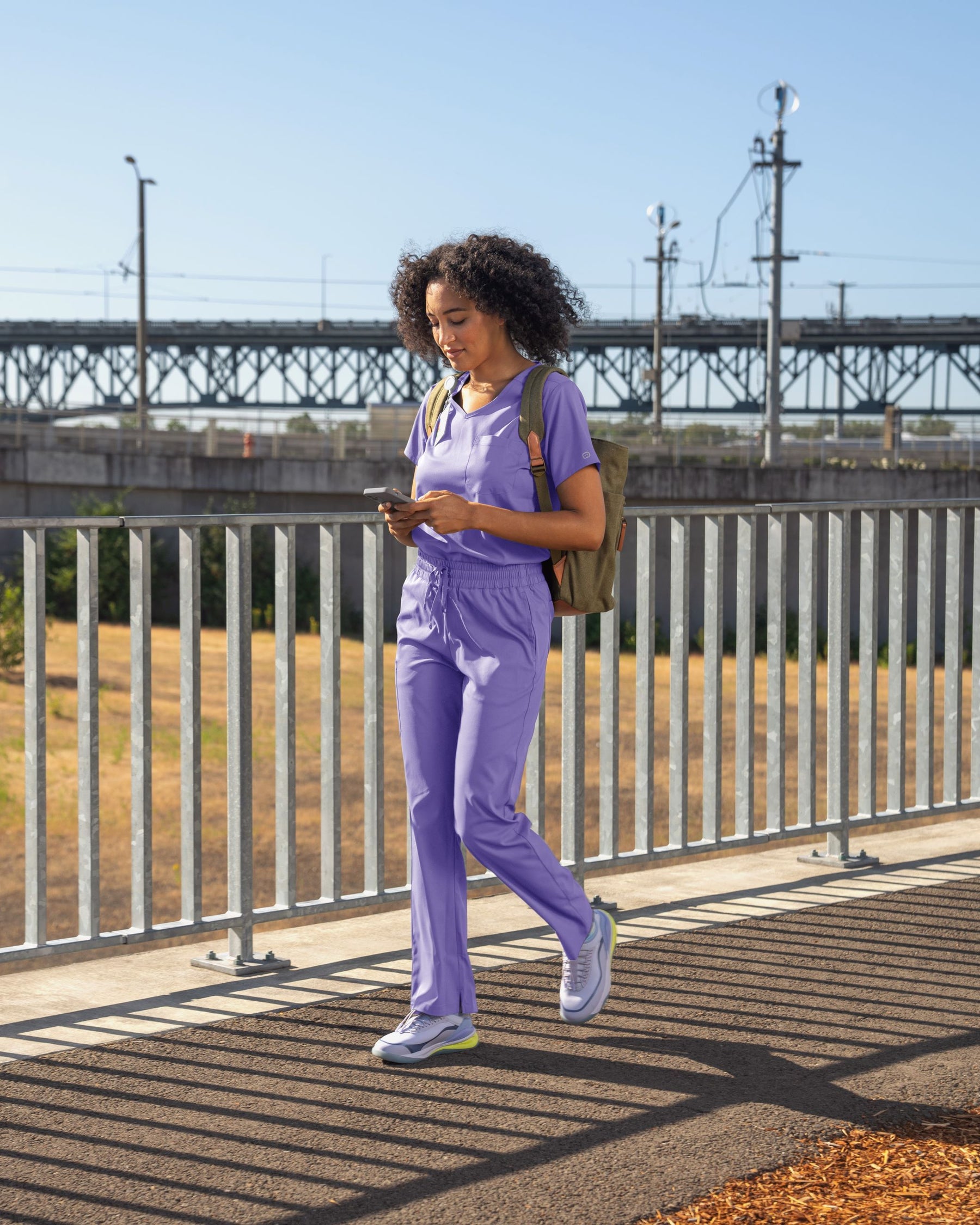 Boundless Women's Tuck-In Scrub Top - Iris Purple