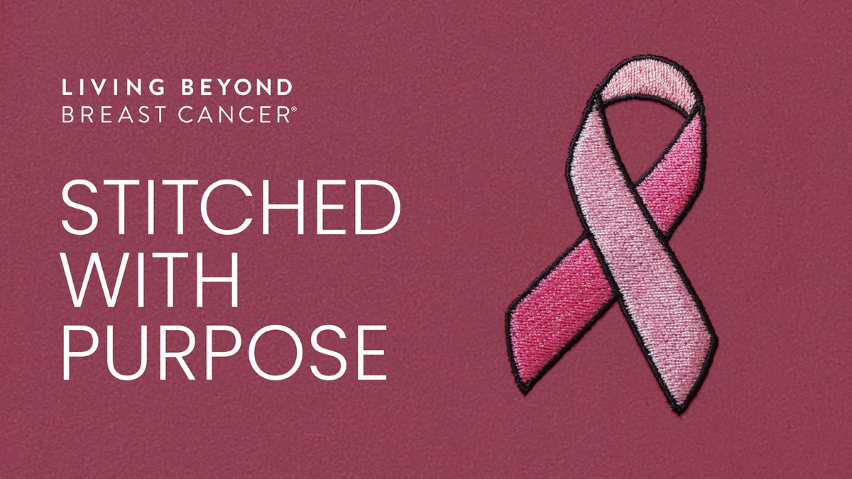 A pink and white embroidered breast cancer awareness ribbon with black stitched outlines, displayed on a textured dark rose background next to white text that reads 'LIVING BEYOND BREAST CANCER' and 'STITCHED WITH PURPOSE'.