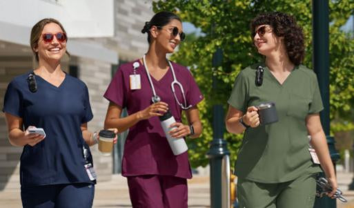 women in wink scrubs outside