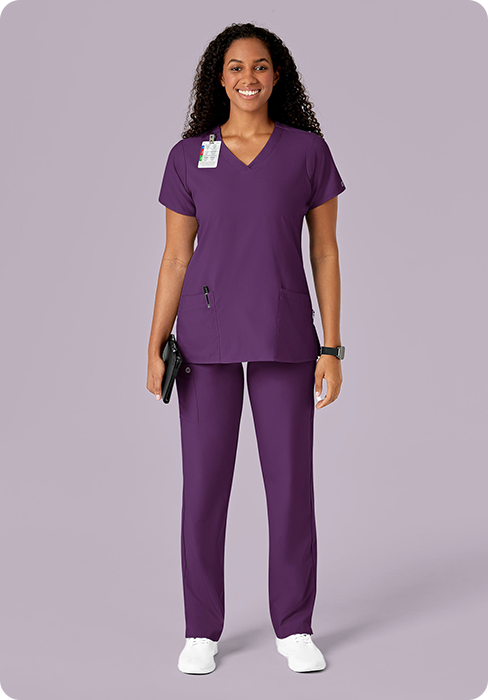 Woman in purple scrubs